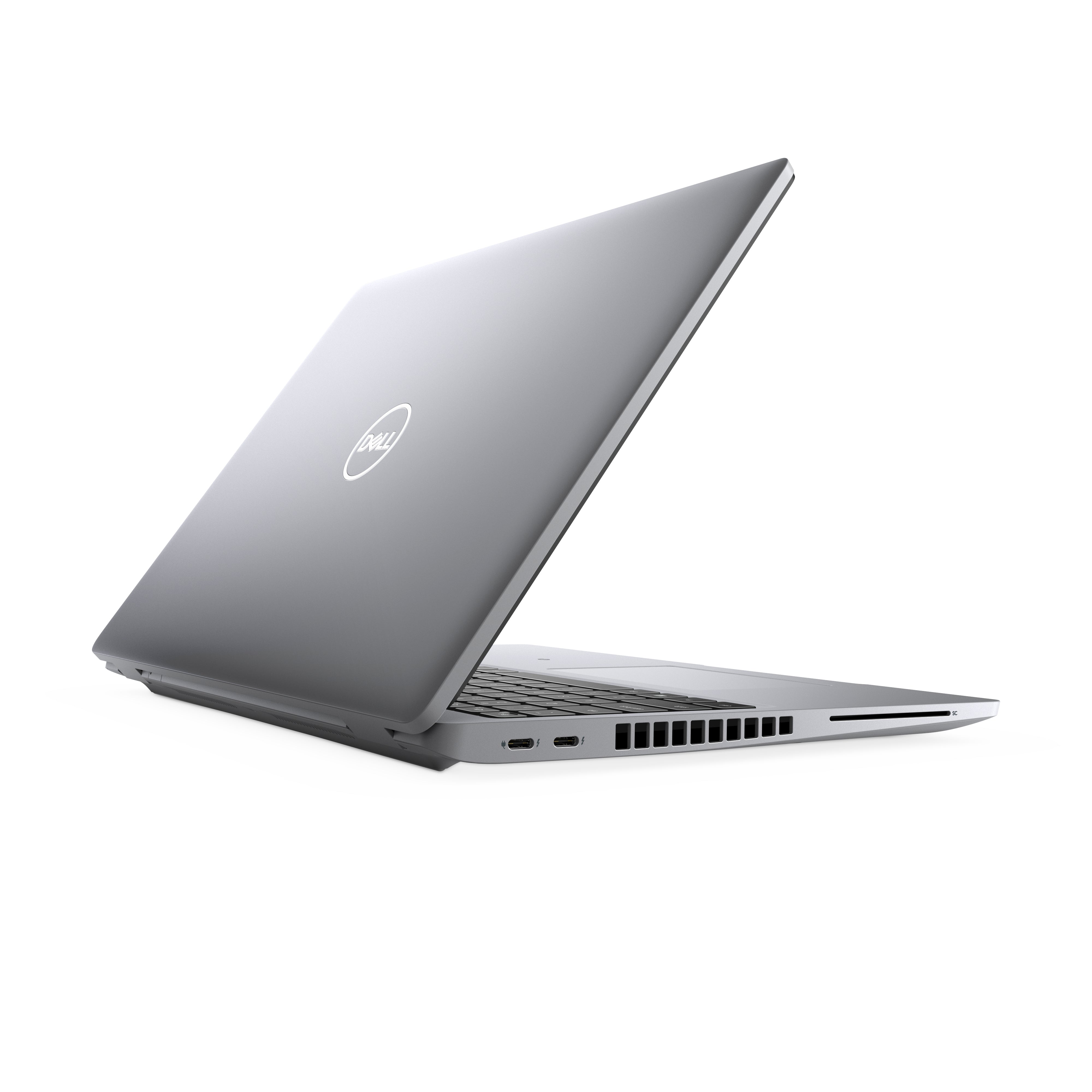 Silver Dell laptop partially open, showing side ports and ventilation on a white background
