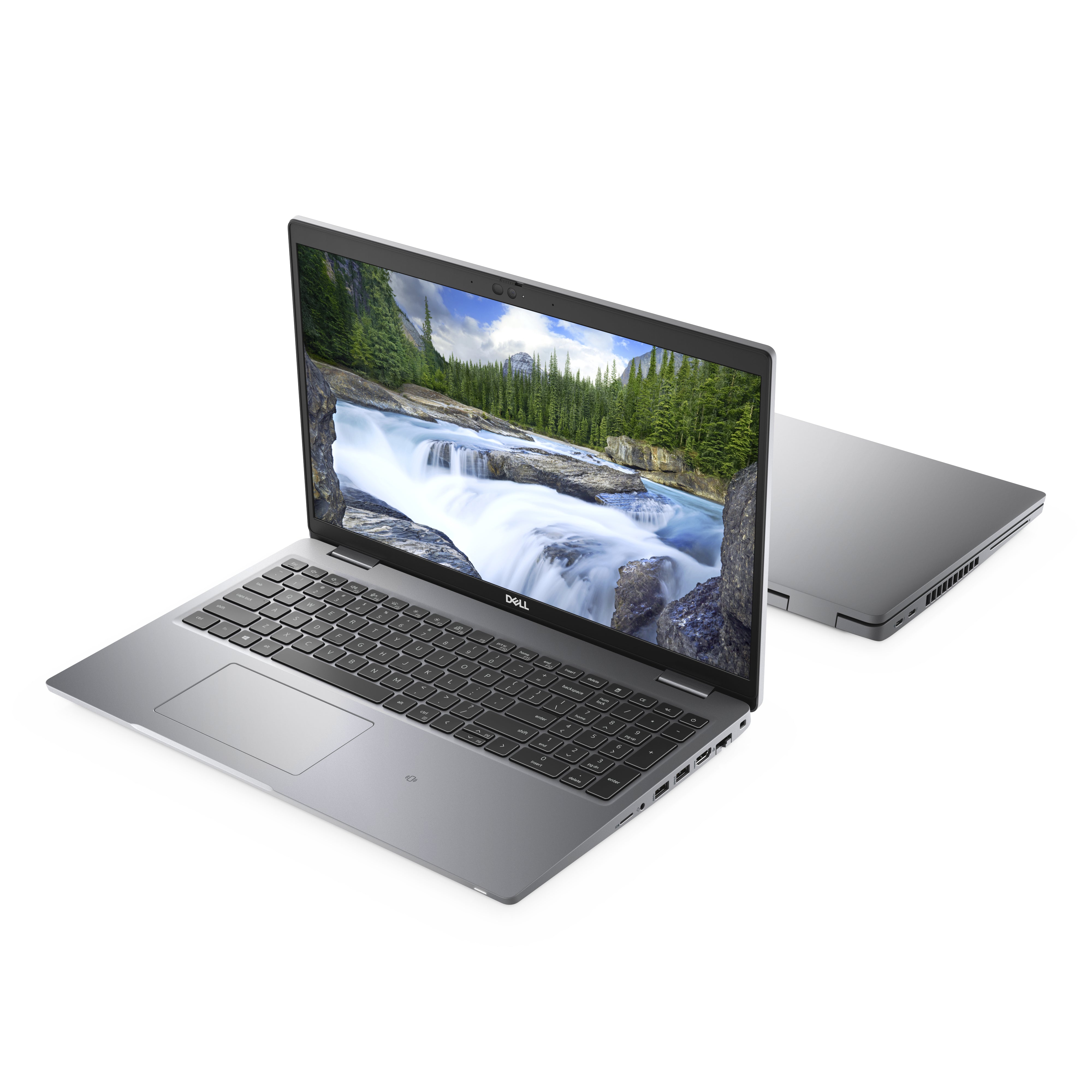 Dell laptop open and closed, grey color, with waterfall nature wallpaper on screen